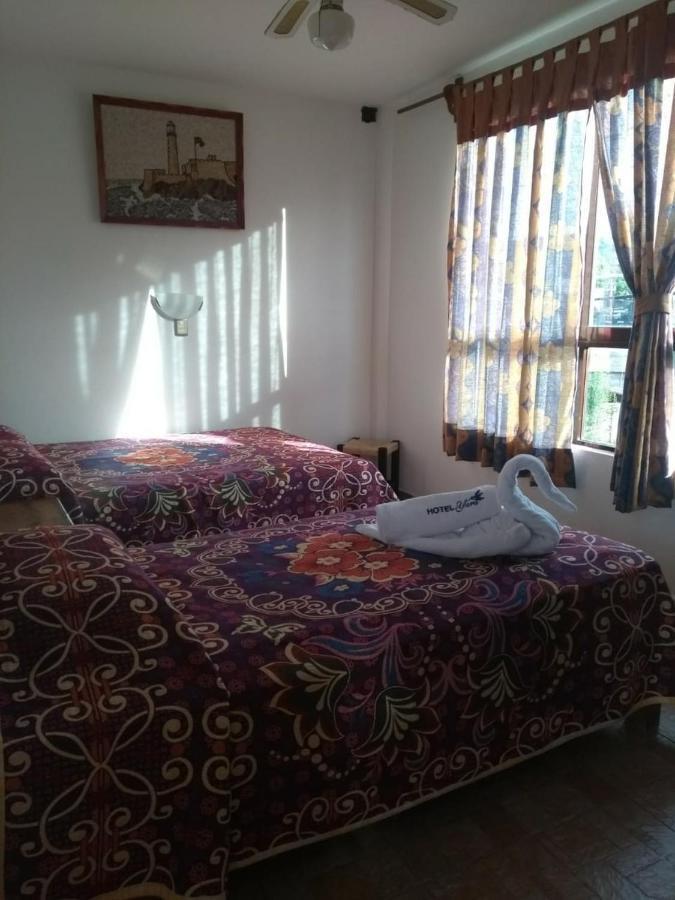 Quarto Triplo com Banheira