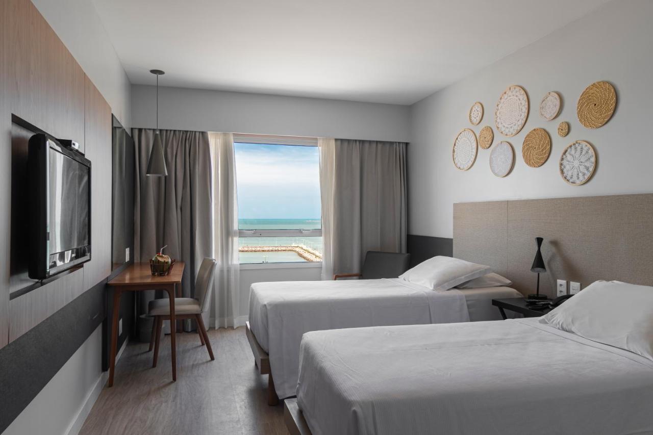 Quarto Superior com 2 Camas de Solteiro e Vista do Mar