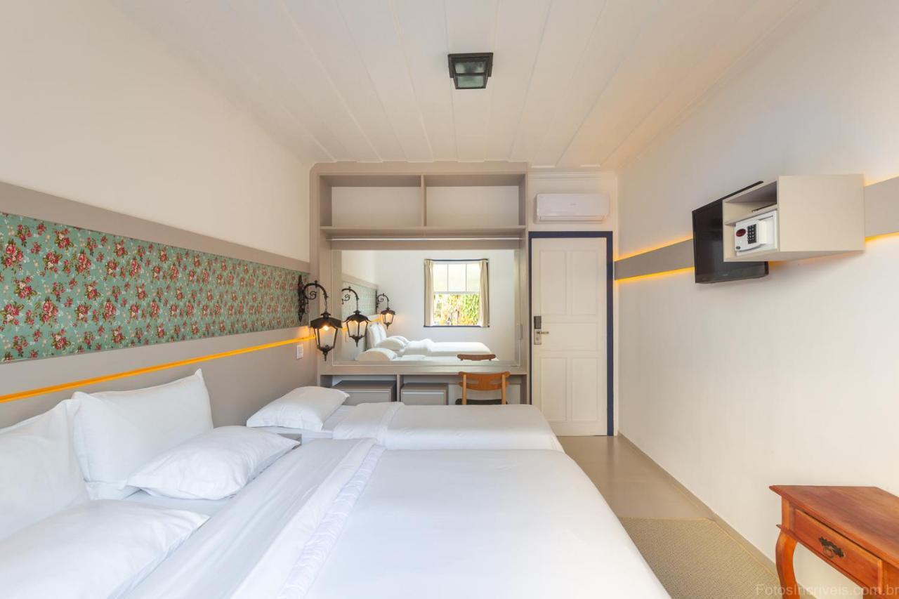 Quarto Triplo Luxo