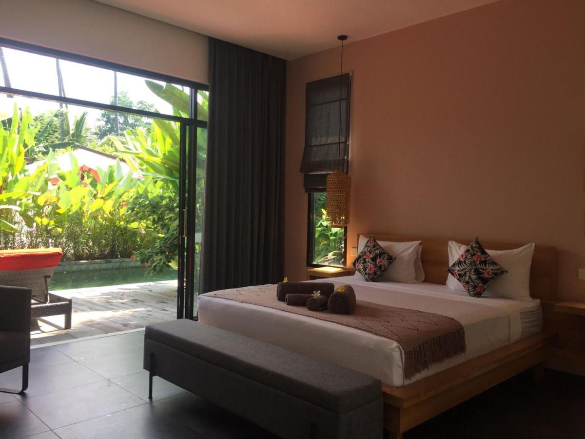 Chambre Lit Queen-Size Deluxe