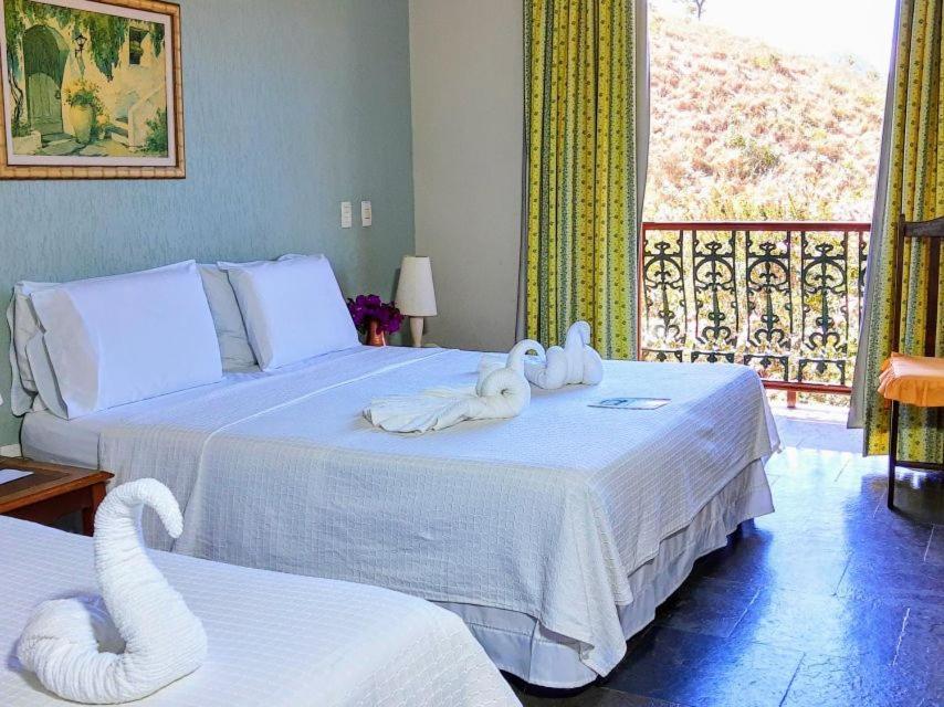 Quarto Duplo Deluxe com Chuveiro