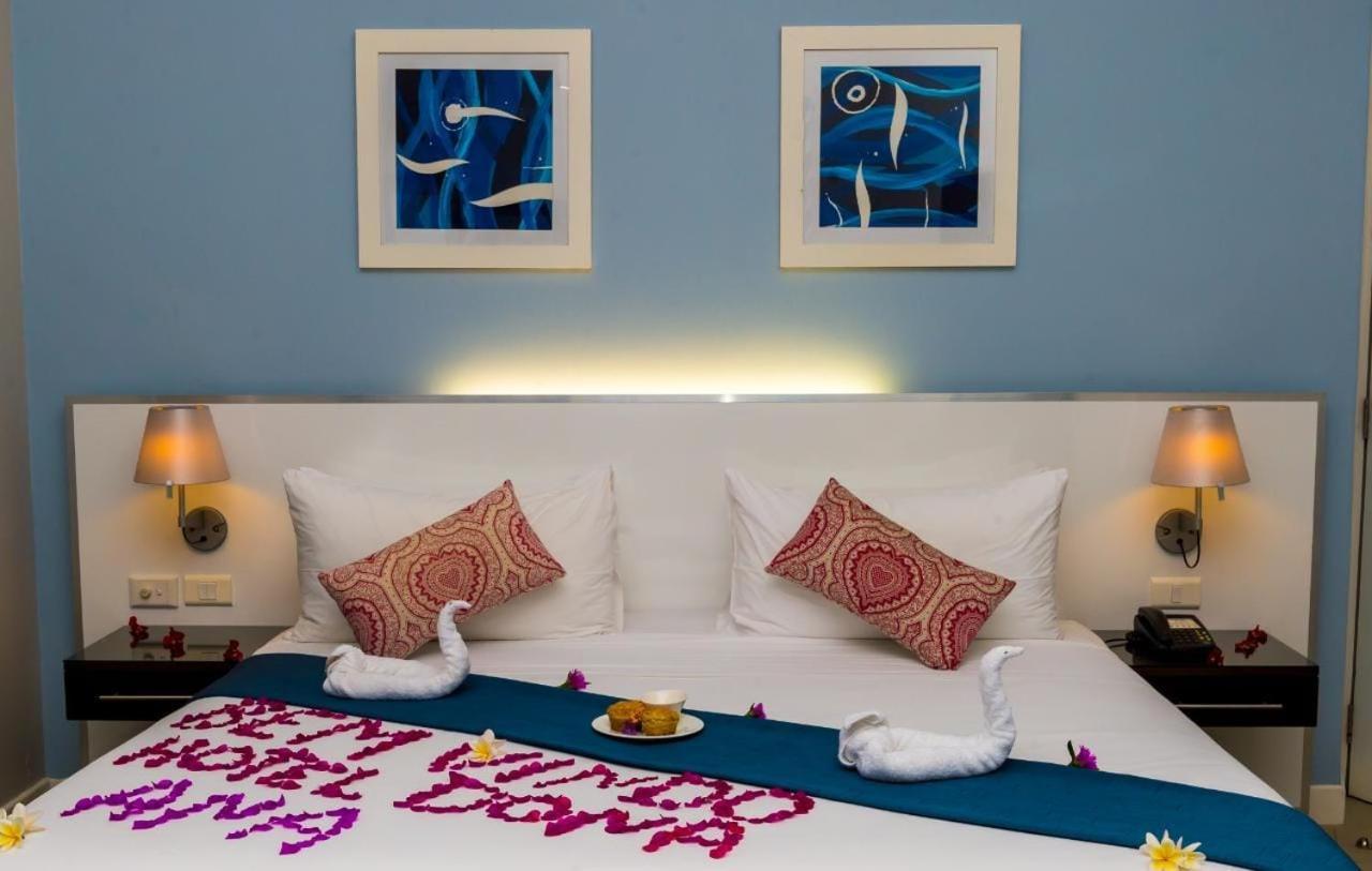 Quarto Deluxe com Cama de Casal ou 2 de Solteiro e Vista do Mar