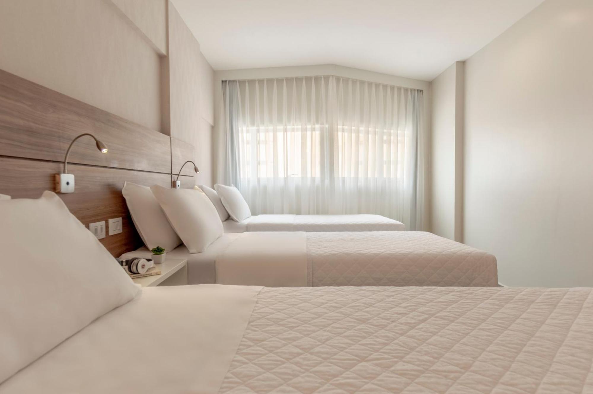 Quarto triplo standard com 3 camas de solteiro