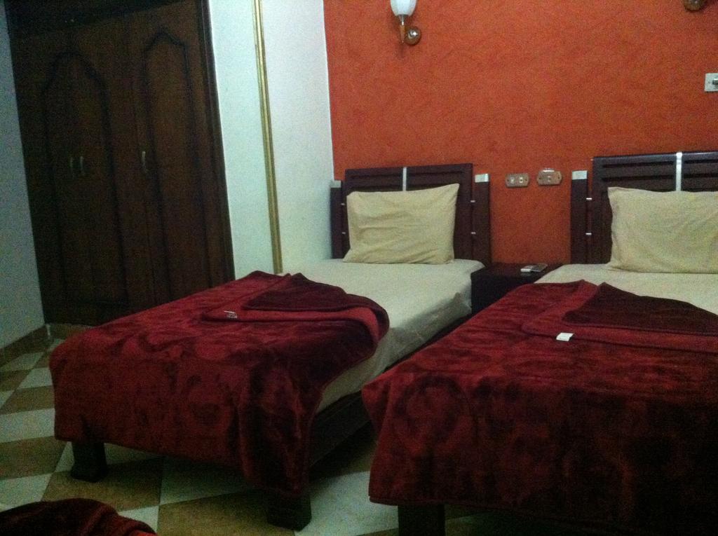 Quarto Família Triplo com Vista do Jardim