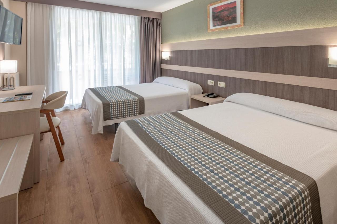 Habitación Cuádruple (3 adultos + 1 niño)