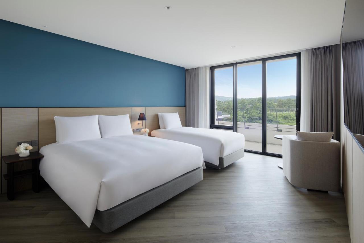 Quarto Família Deluxe com 2 Camas de Solteiro