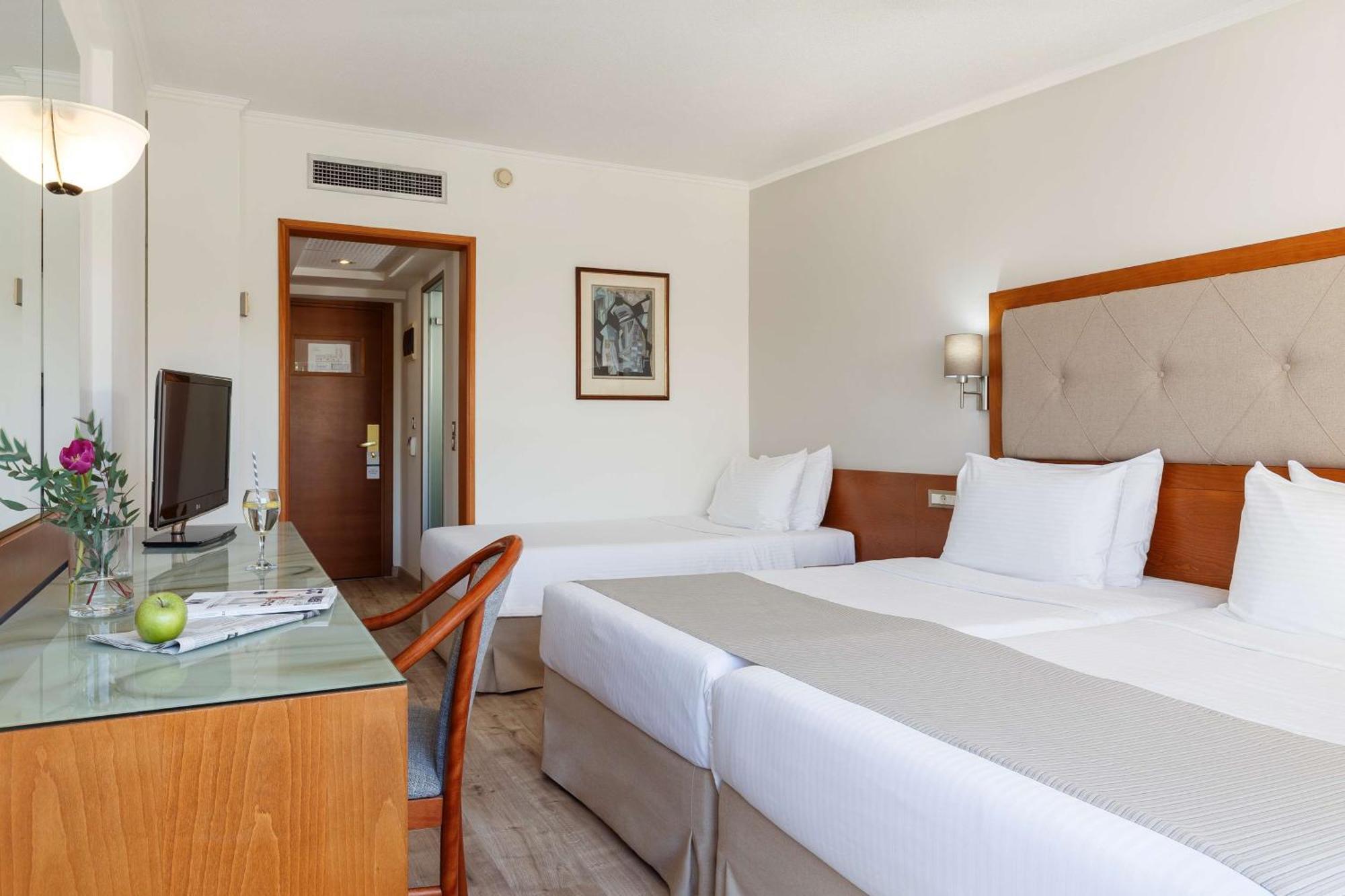 Junior Suite met Queensize Bed en Slaapbank
