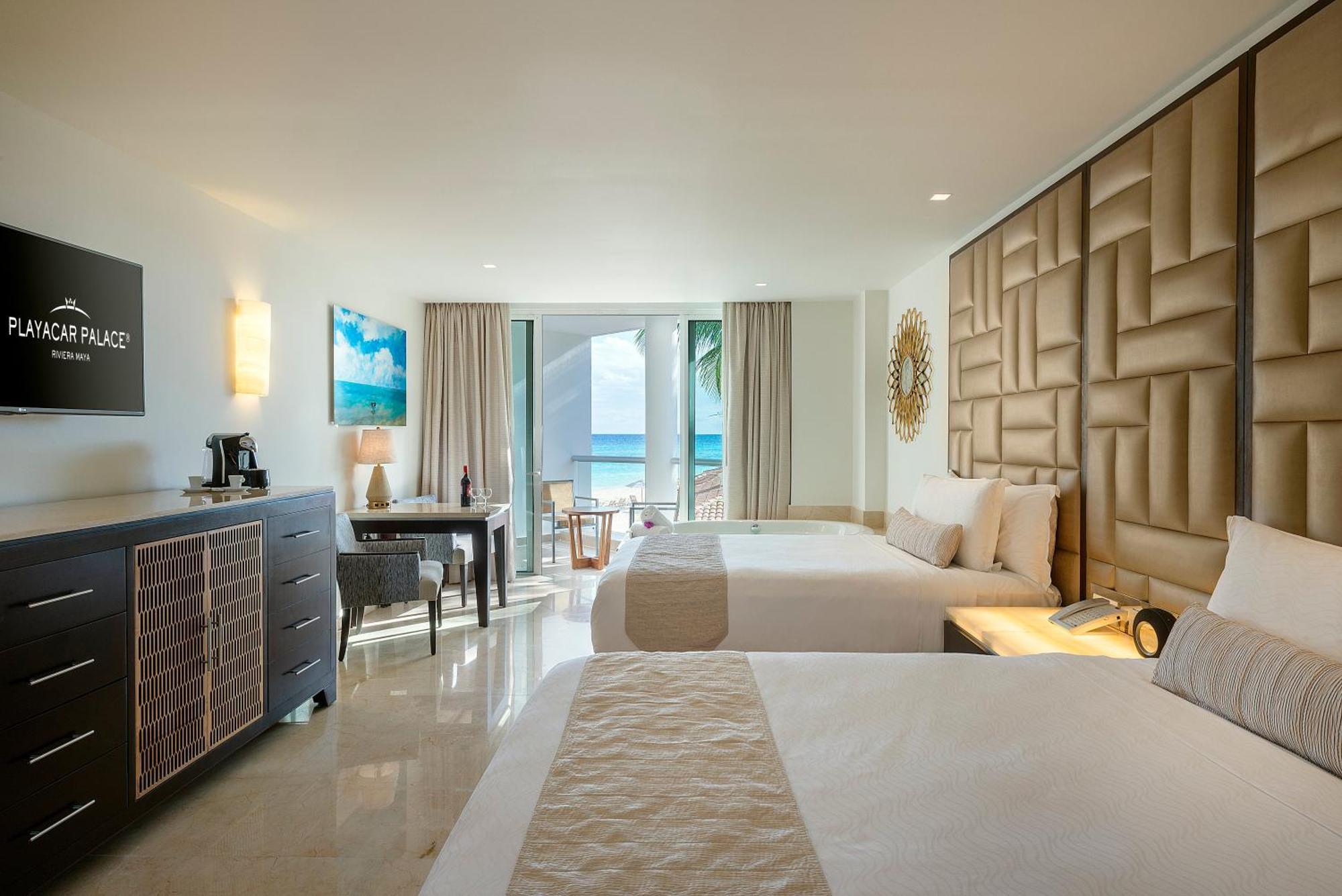 Quarto superior deluxe com vista parcial do mar - Gratuito para crianças e adolescentes