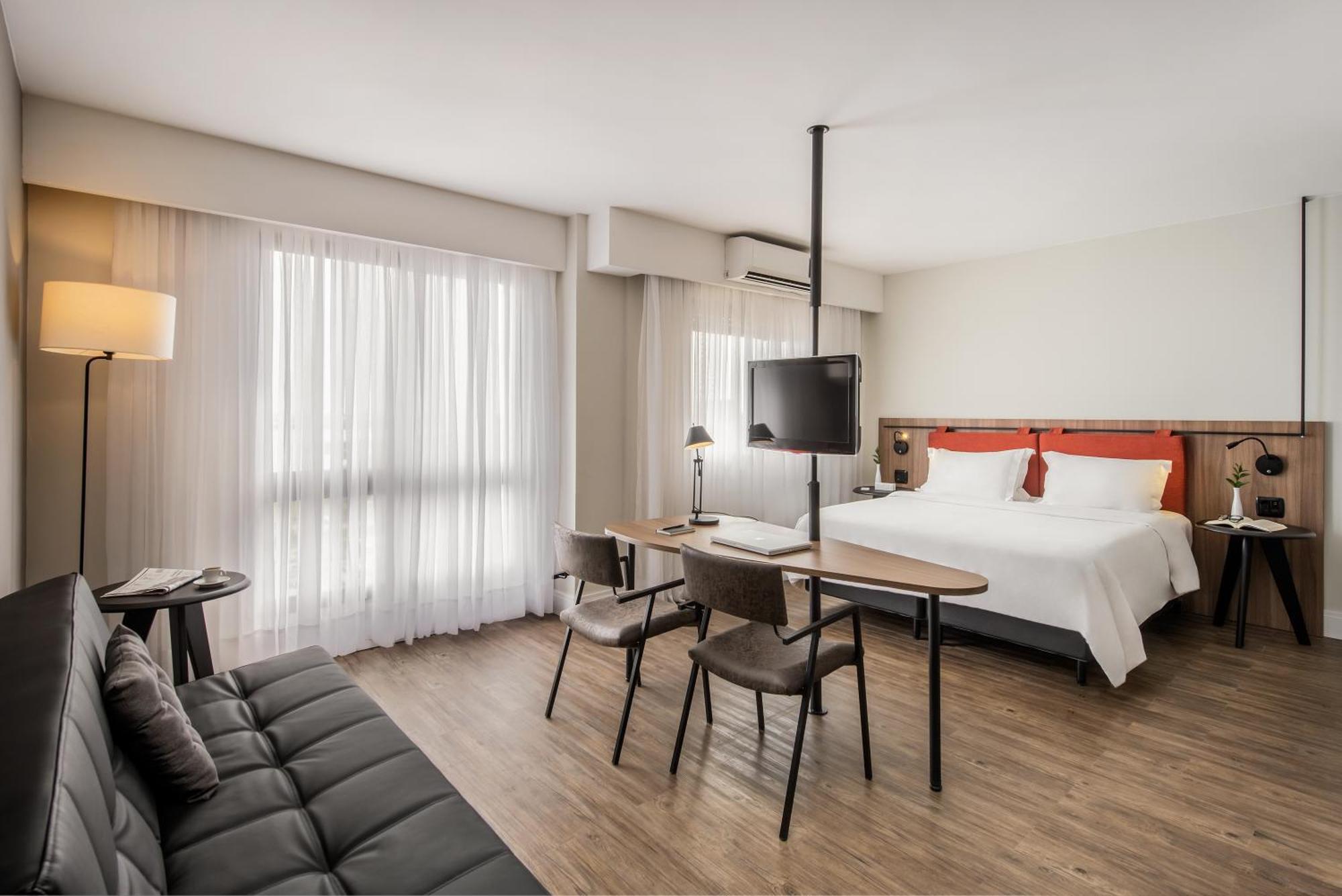 Quarto duplo superior de luxo com 1 cama queen-size e 1 sofá-cama