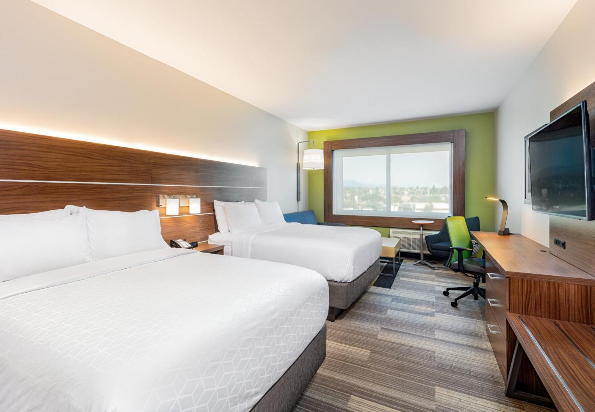 Queen Suite with Two Queen Beds and Sofa Bed