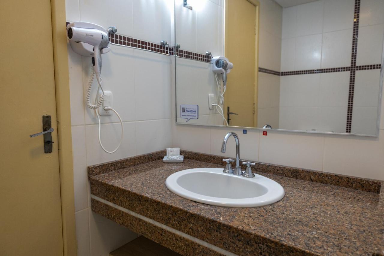 Quarto Triplo Executivo