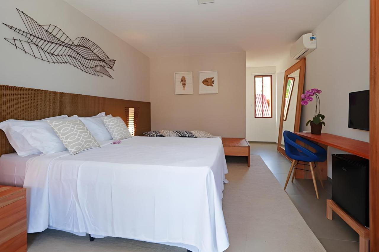 Apartamento de luxo com vista lateral do mar