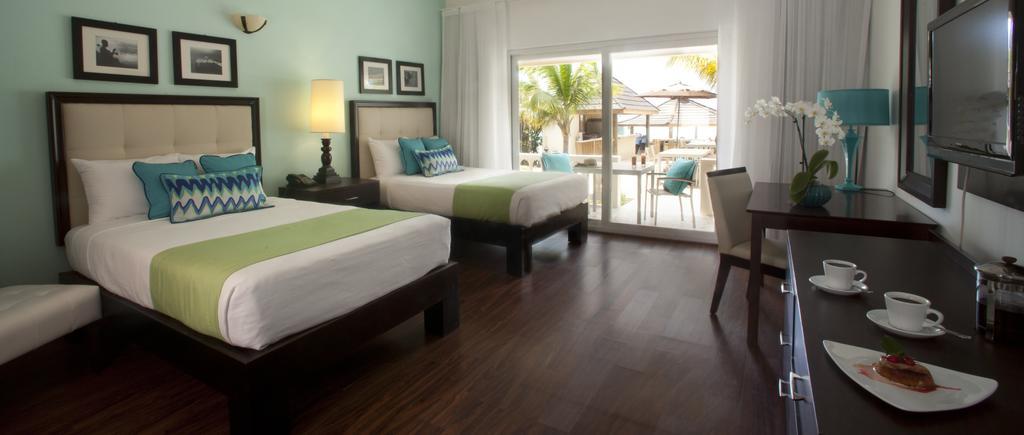 Kamer met Kingsize Bed of Tweepersoonsbed met Uitzicht op de Oceaan