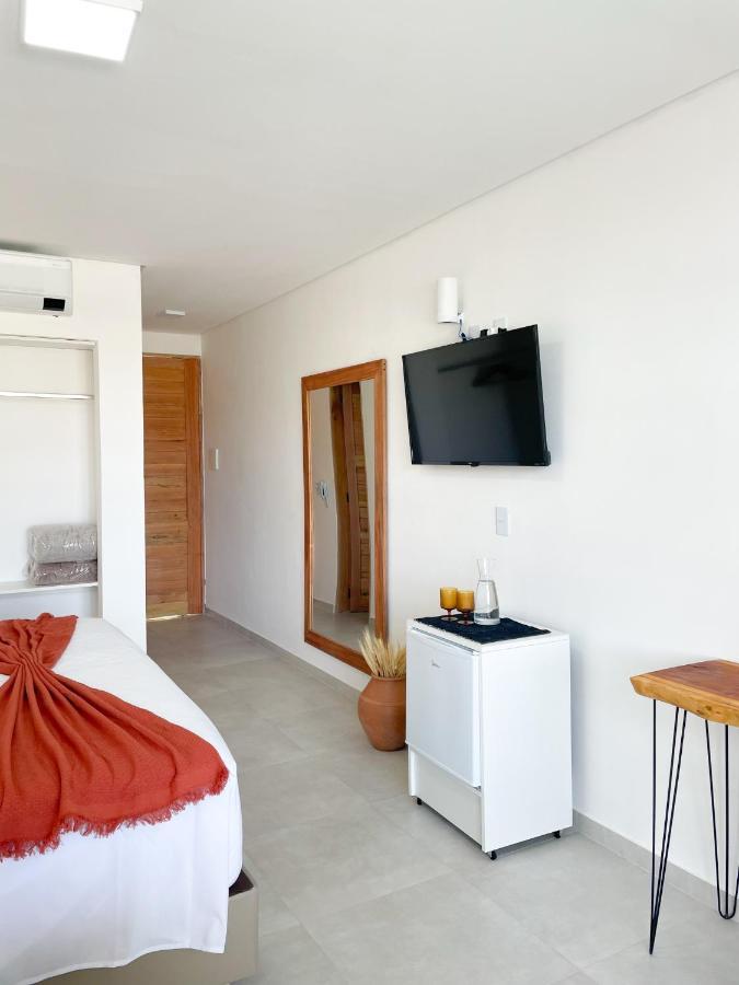 Quarto Triplo com Vista para a Piscina