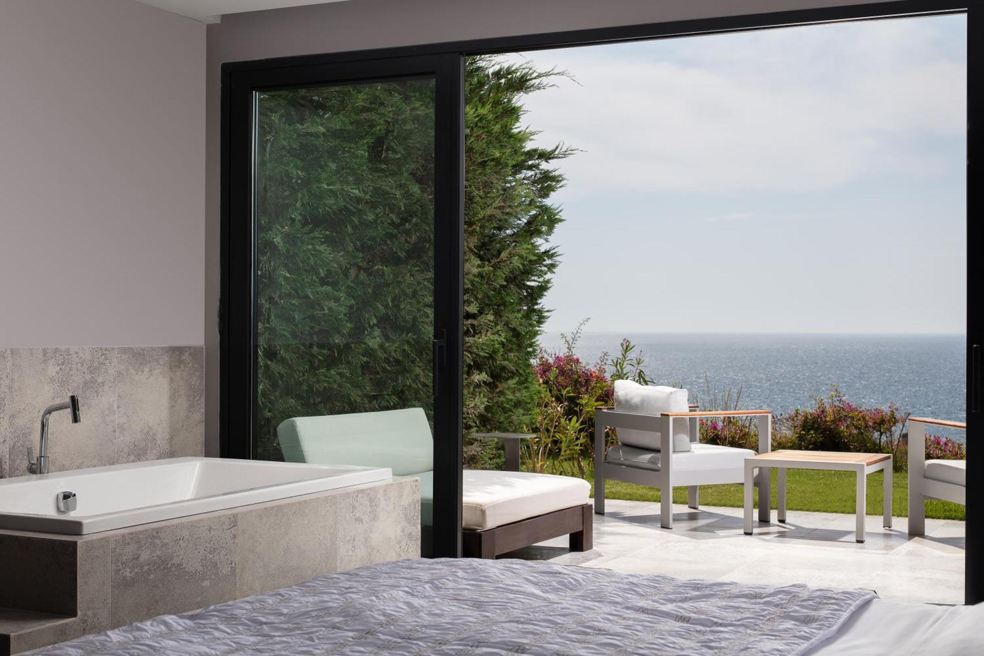 Junior Suite mit 1 Kingsize-Bett, Meerblick und Balkon