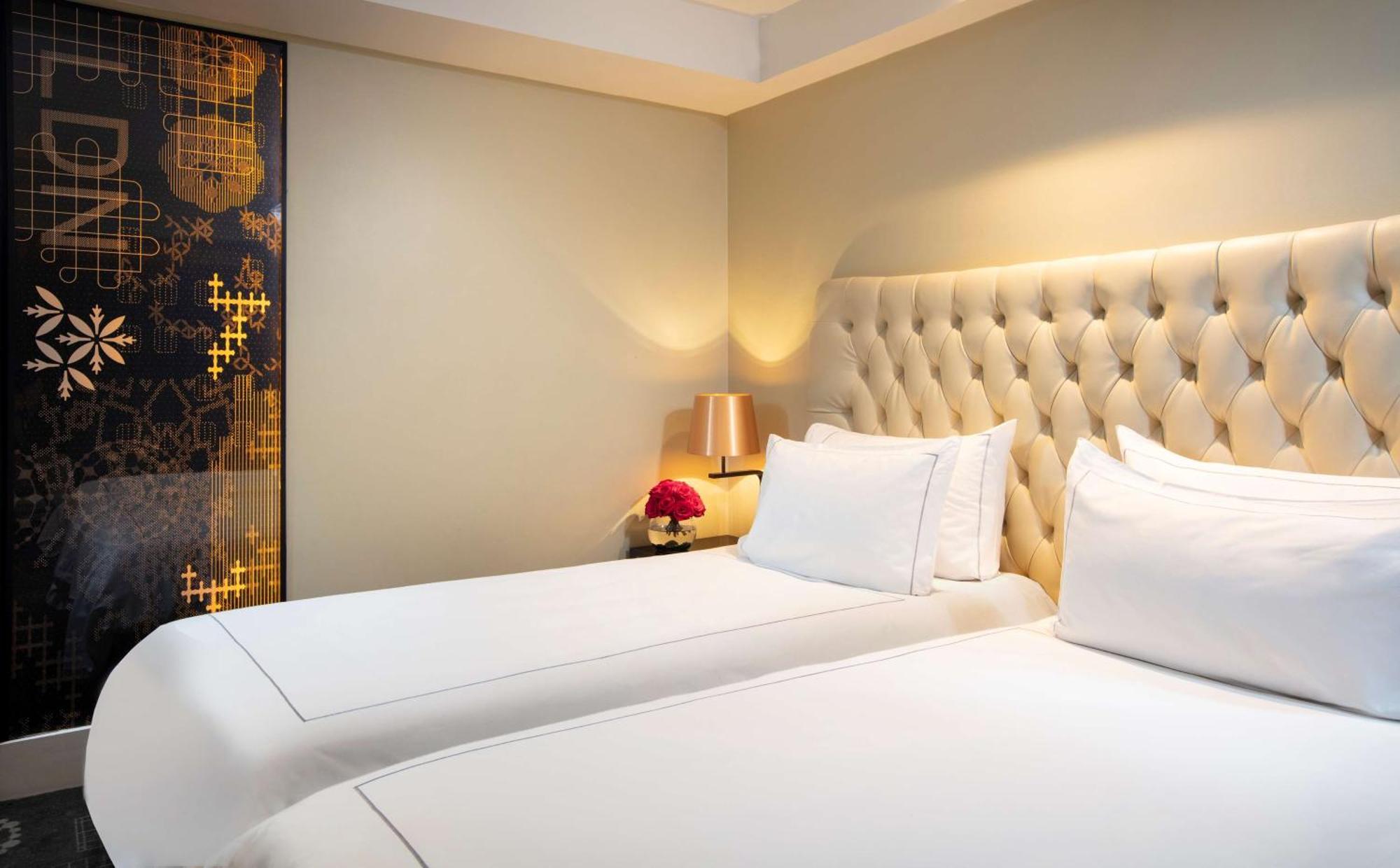Camera Deluxe Doppia con Letti Singoli con Divano-Letto
