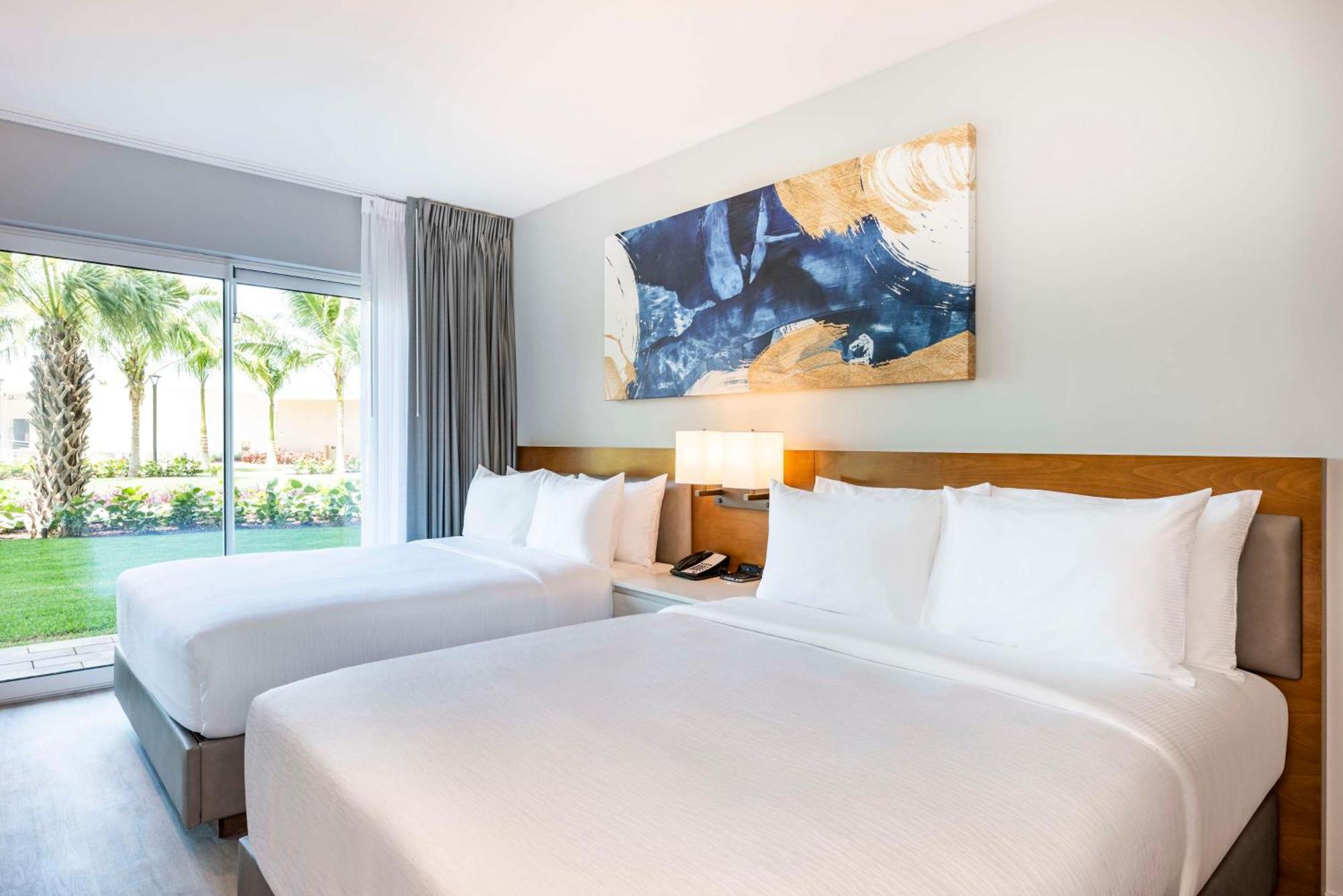 One Bedroom Suite Two Queen Beds Pool or Patio