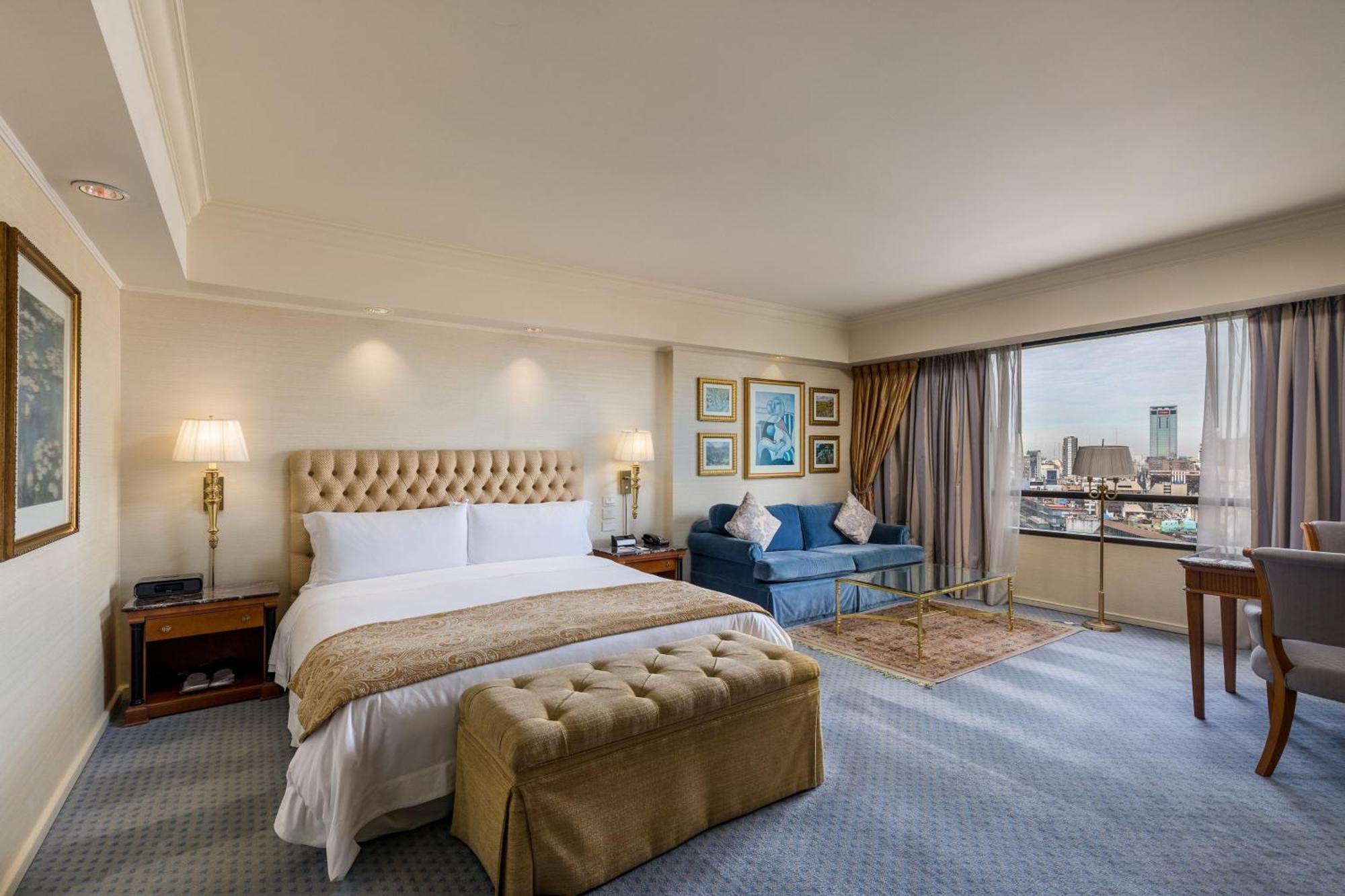 Quarto Grande Deluxe com Cama King-size e Vista da Cidade