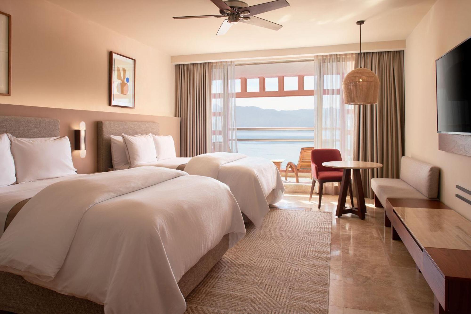 Junior Suite Two Double Beds Partial Ocean View,1563278125:JPEG