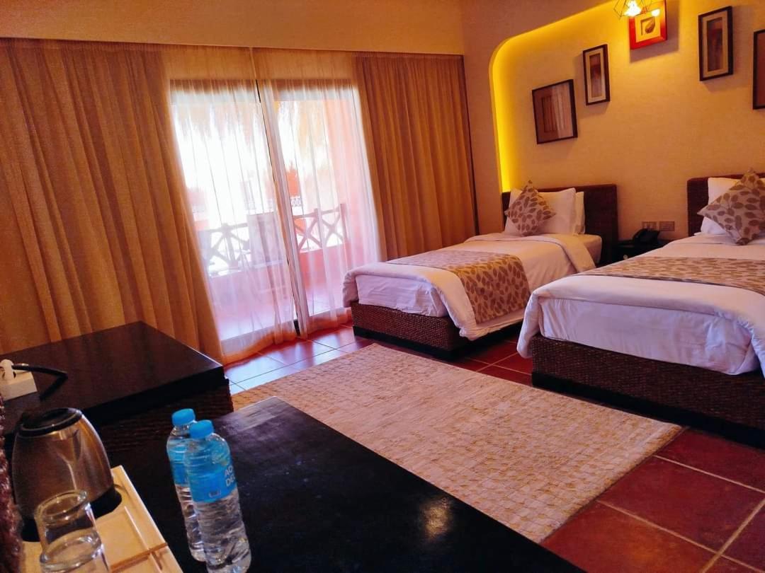 Double or Twin Room Pool View,1573230536:JPEG