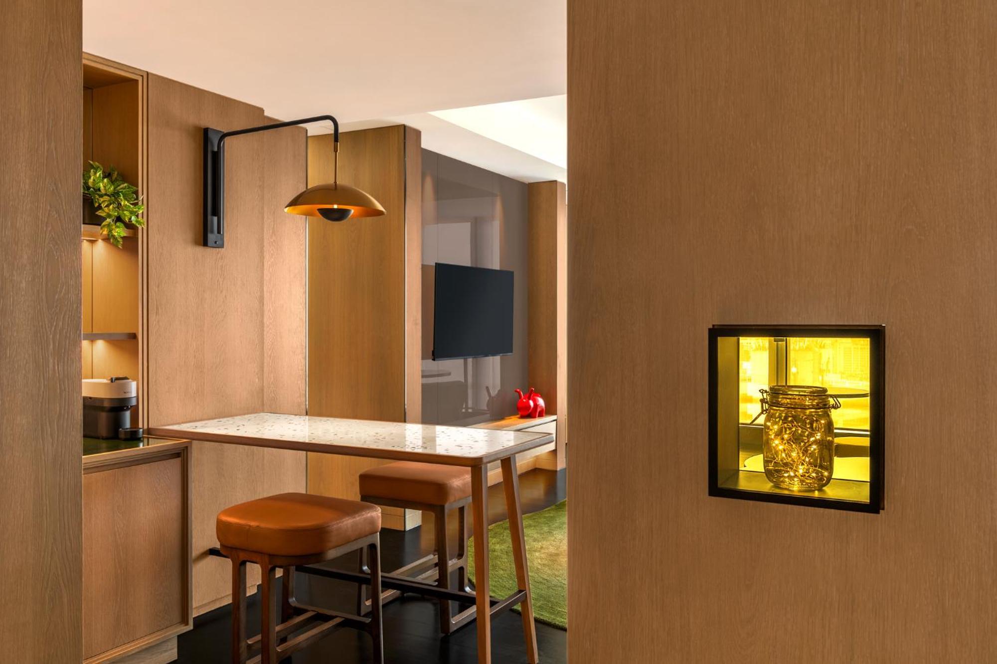 Marvelous One-Bedroom Suite with Two Double Beds and City View