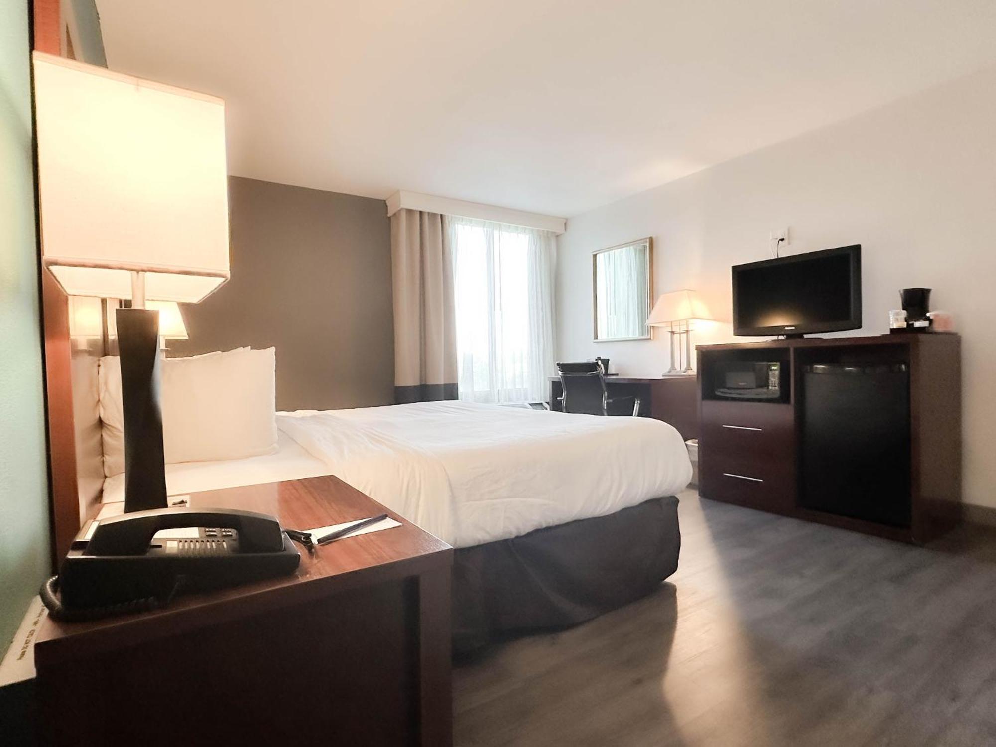 Quarto King Deluxe com Sofá-cama