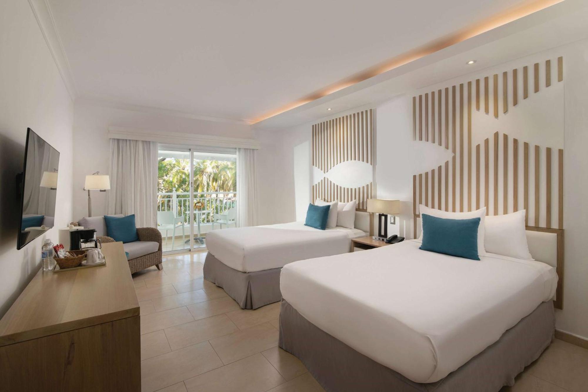 Habitación Premium con 2 camas dobles y vistas al jardín