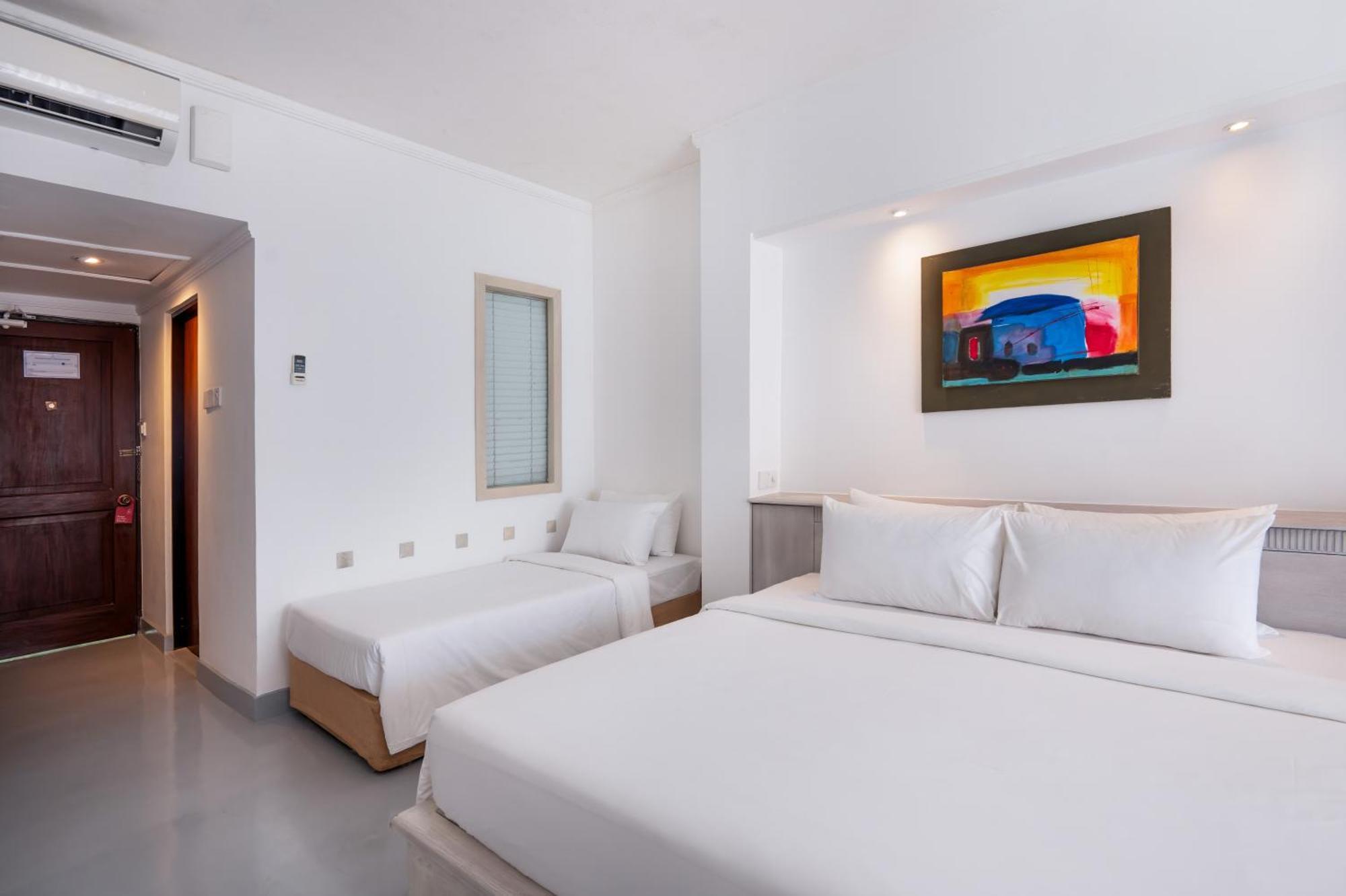 Chambre Triple Deluxe