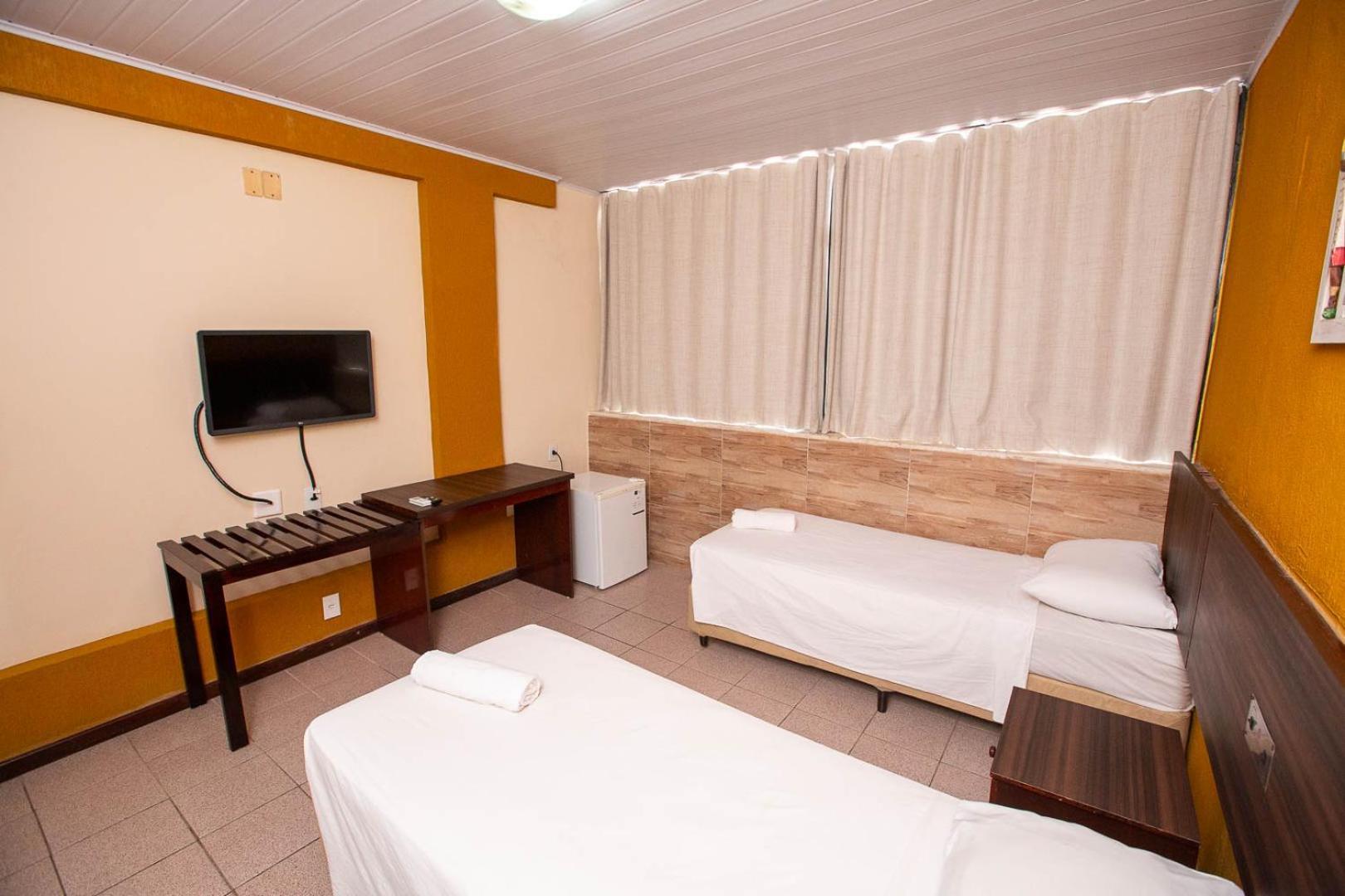 Quarto Triplo Standard com 3 Camas de Solteiro