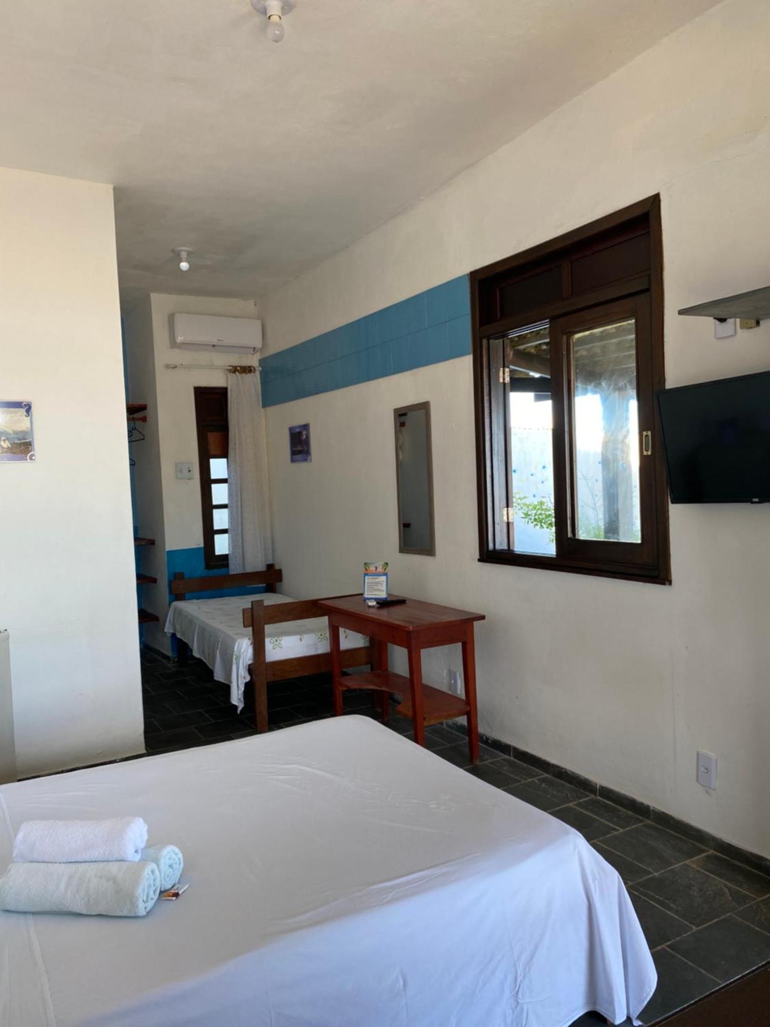 Quarto Triplo com Vista do Mar