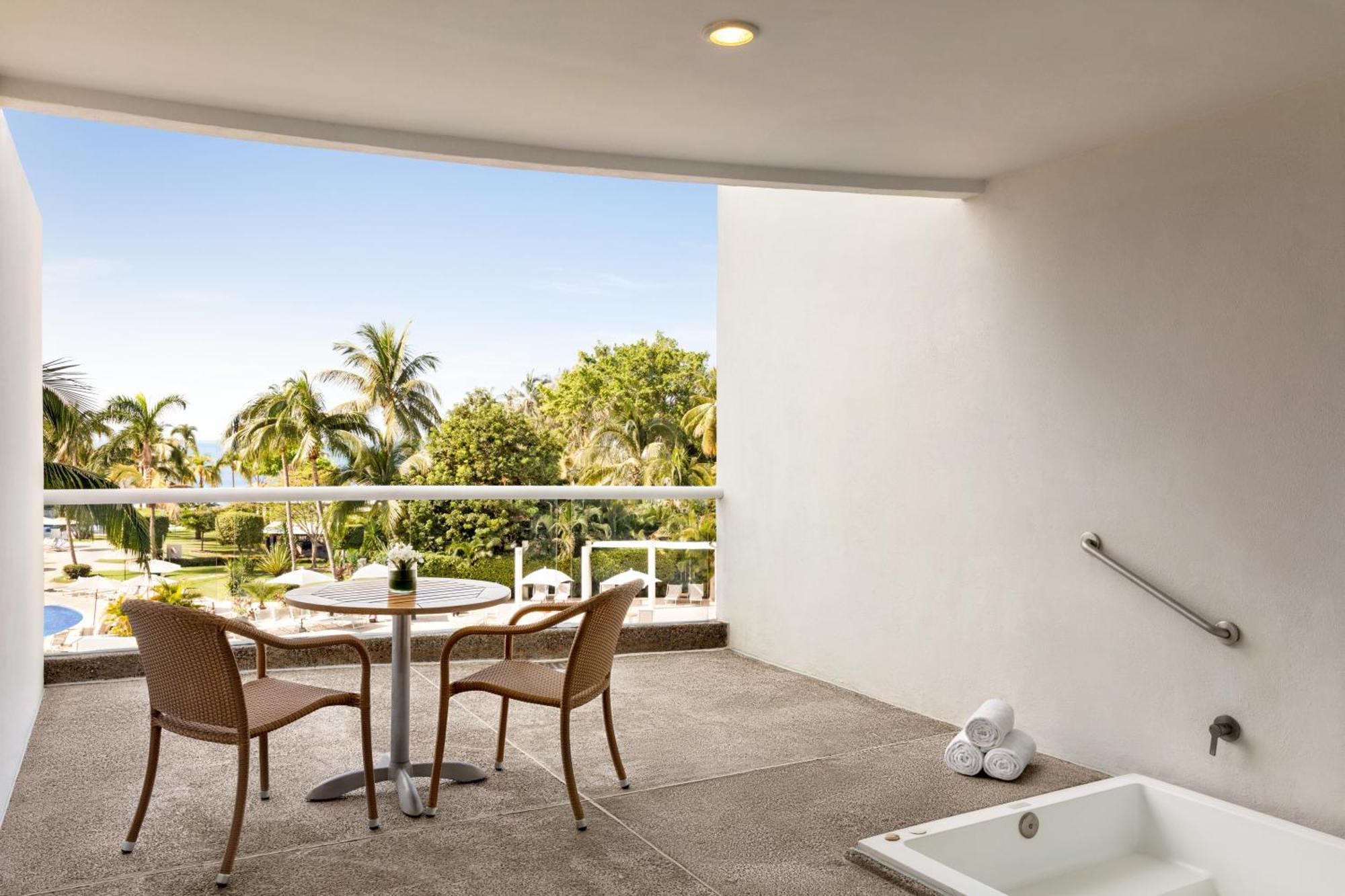 Suite Junior con vistas parciales al mar y 1 cama extragrande
