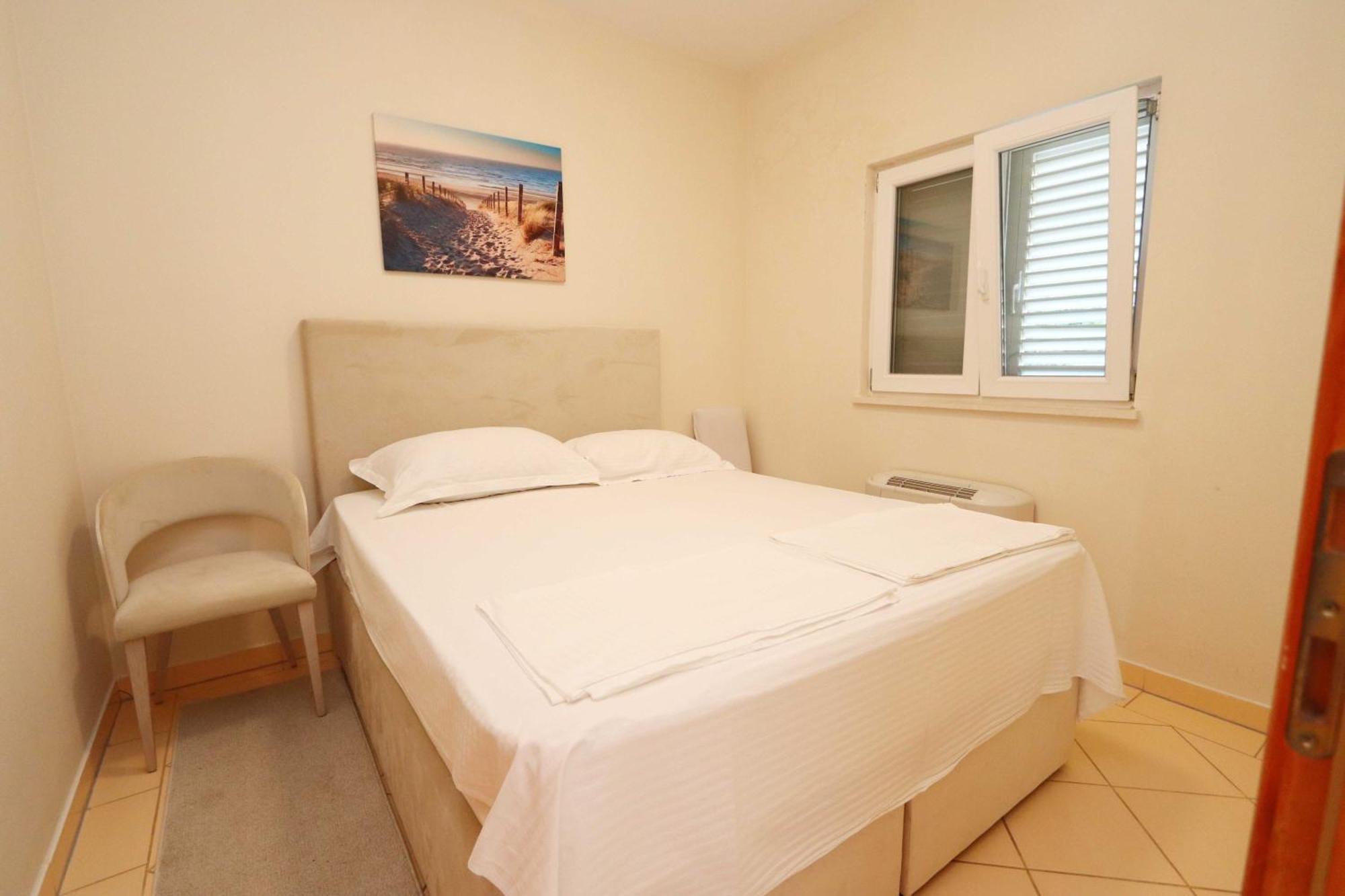 Two-Bedroom Suite with Balcony and Garden View