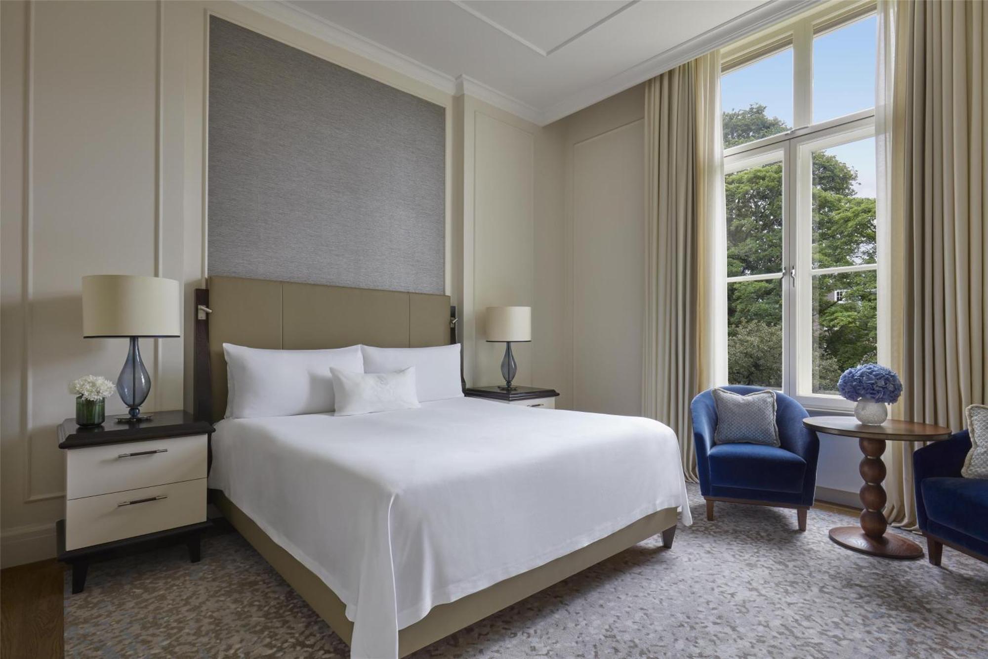 Habitación con cama extragrande Grand Premier
