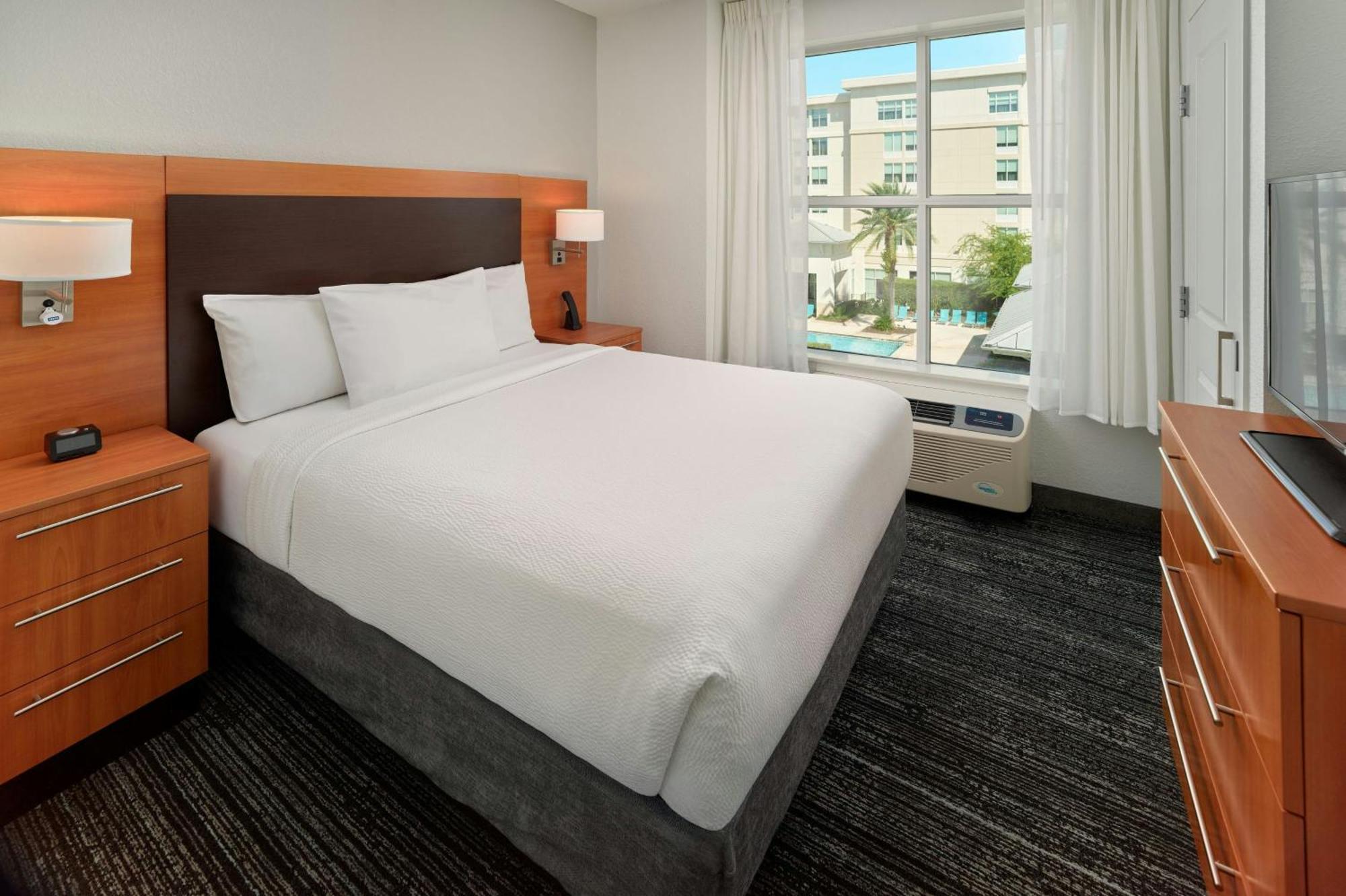 Suíte Queen de 2 Quartos com Sofá-cama