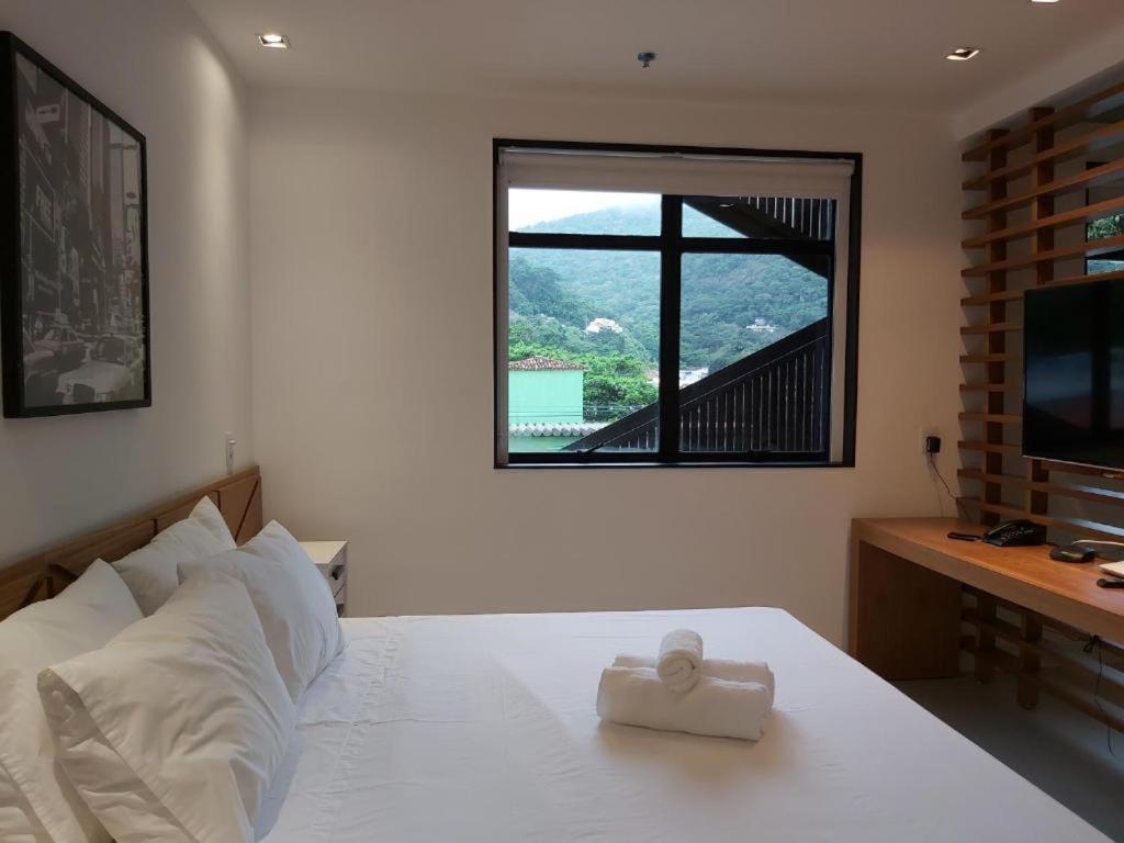 Quarto Triplo com Vista do Lago