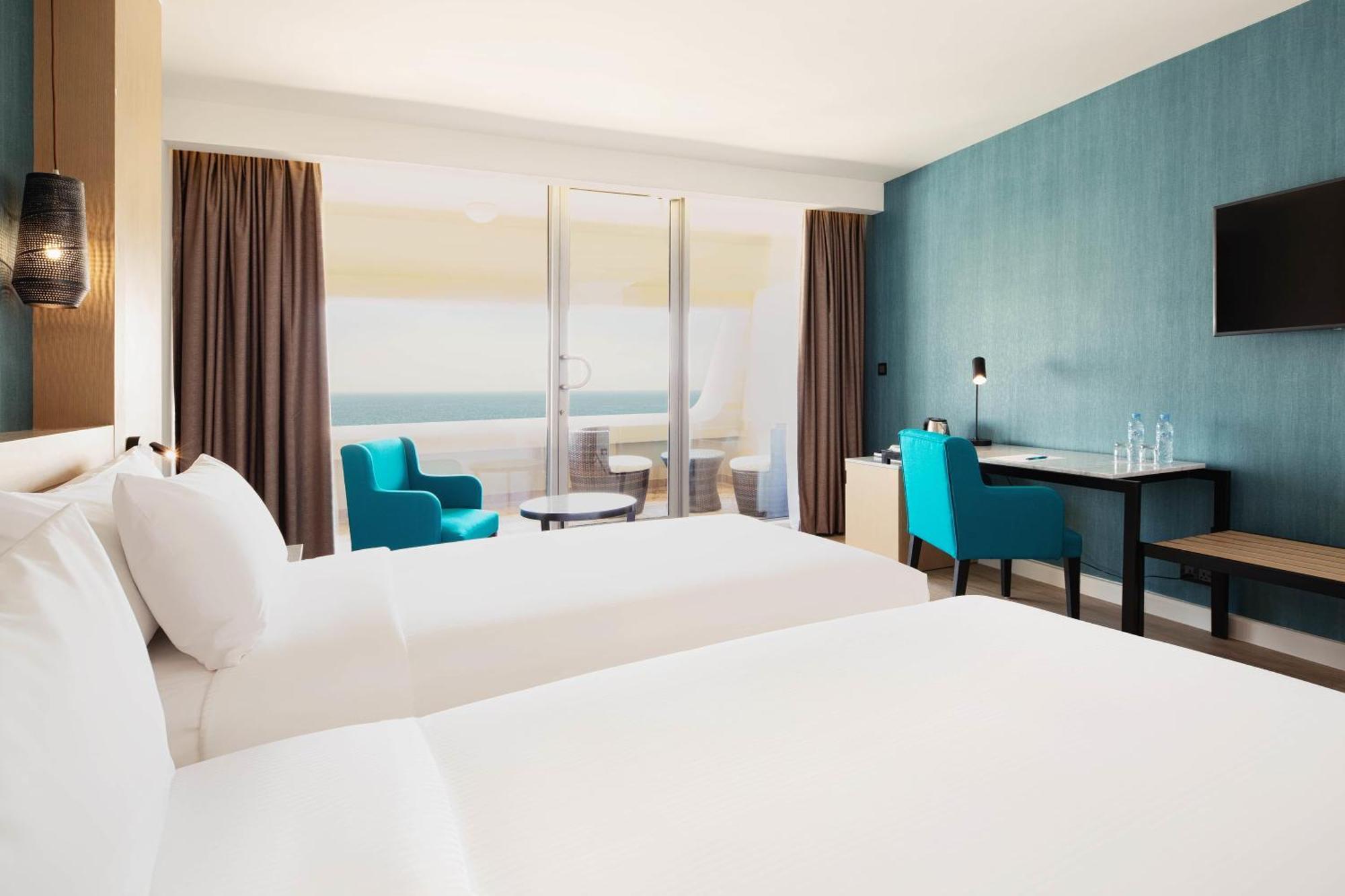 Deluxe Zimmer mit Meerblick und Balkon