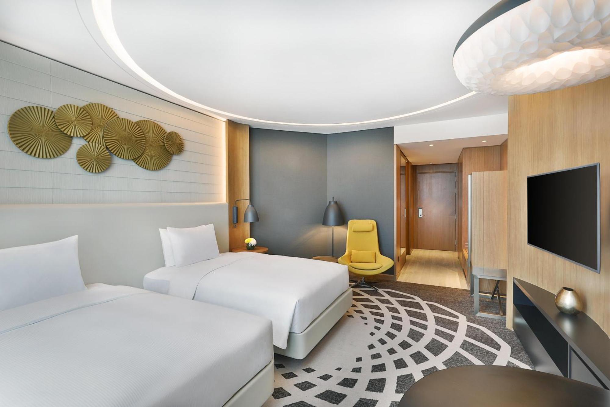 Quarto Duplo com 2 Camas de Casal