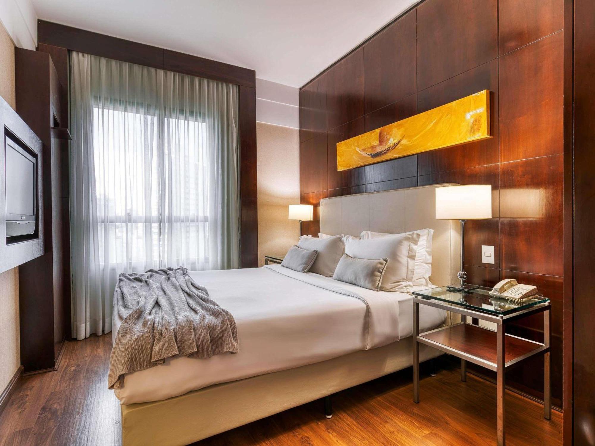 Suíte Júnior com Cama Queen-size e Sofá-cama