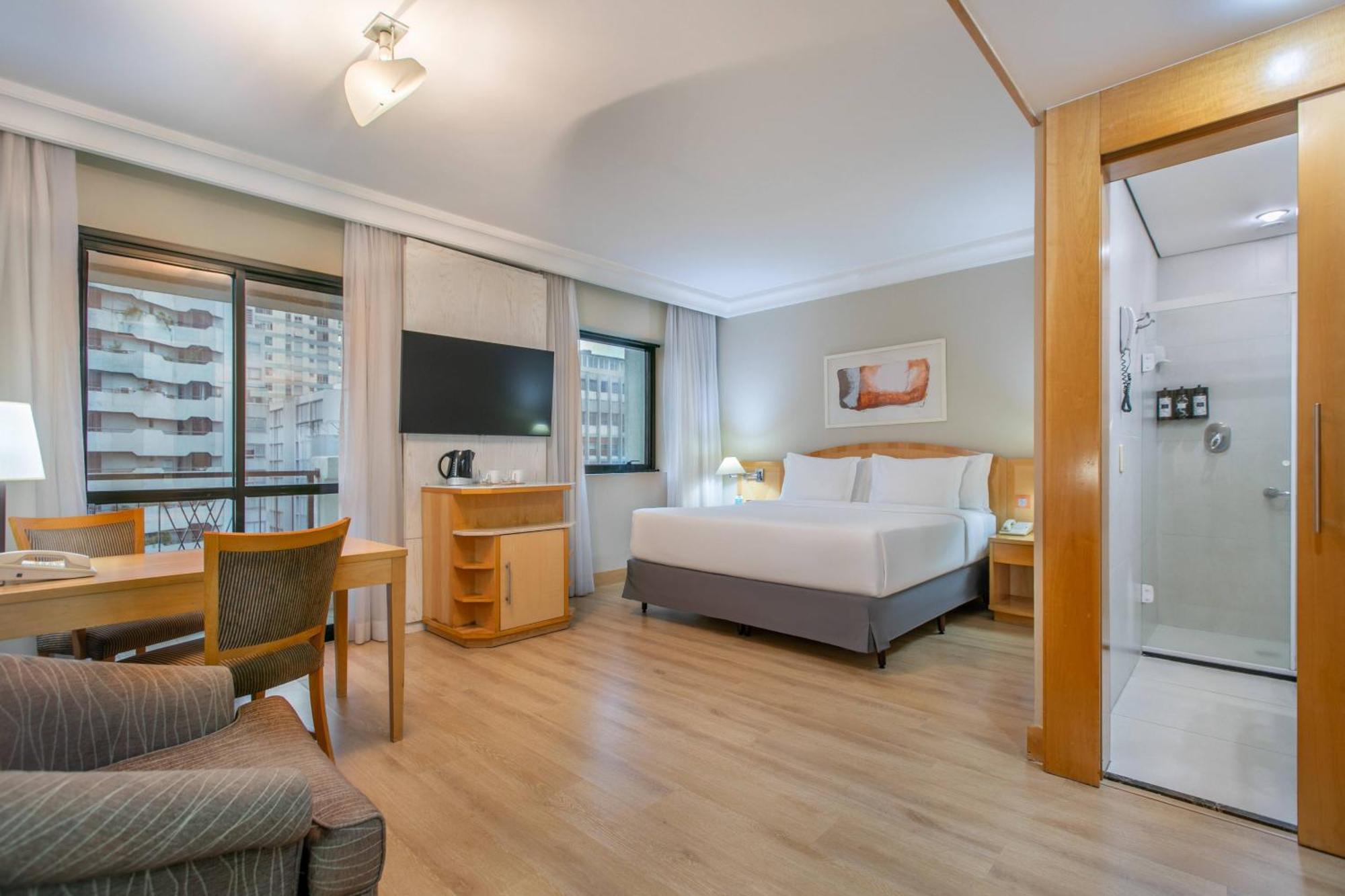 Quarto The Innside com Cama Queen-size e Varanda