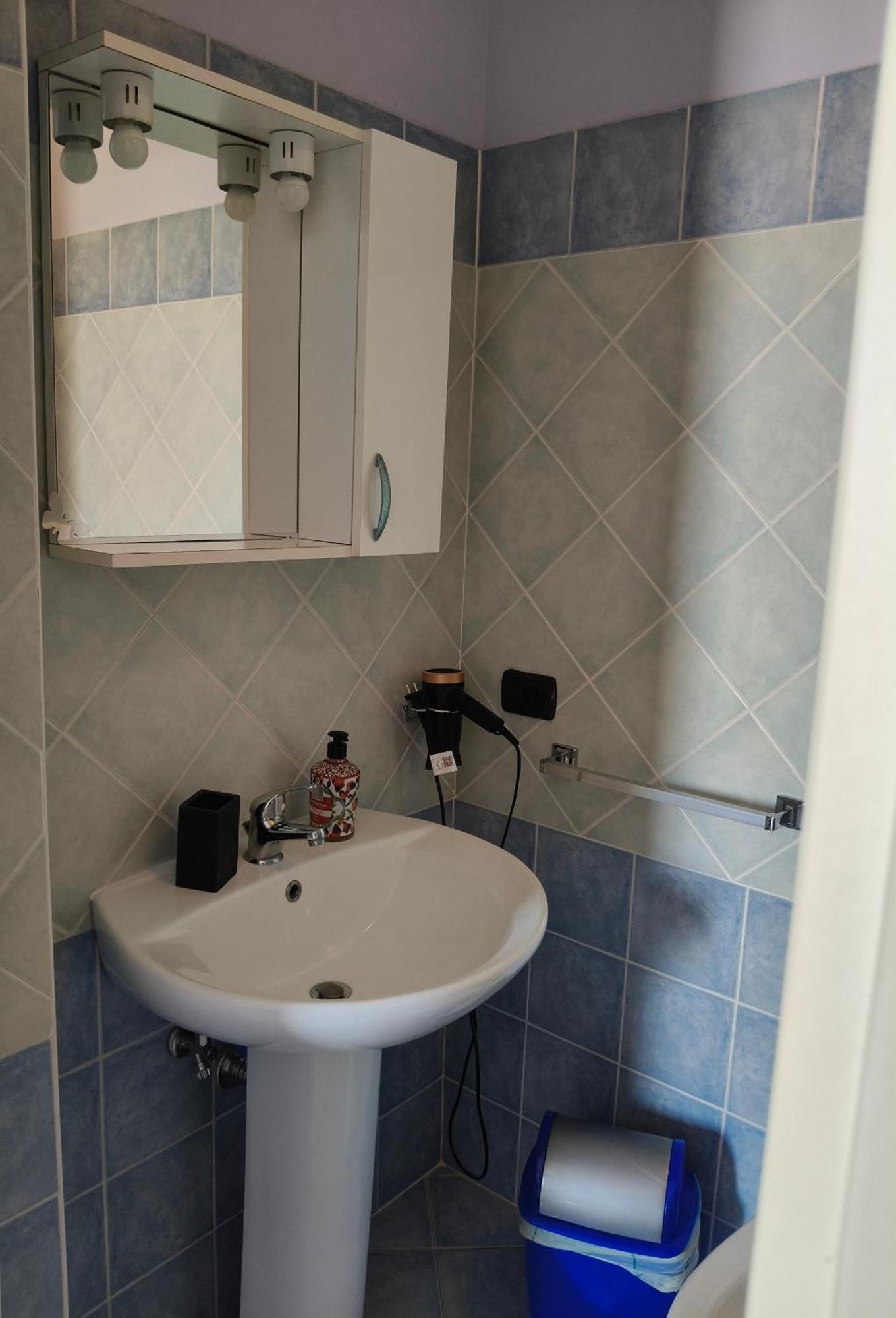 Family Room Private Bathroom,1773755649:JPEG