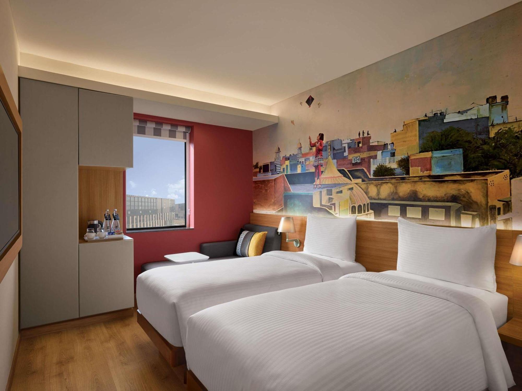 Deluxe Twin Room One-Way Complimentary Airport Transfer on F&B