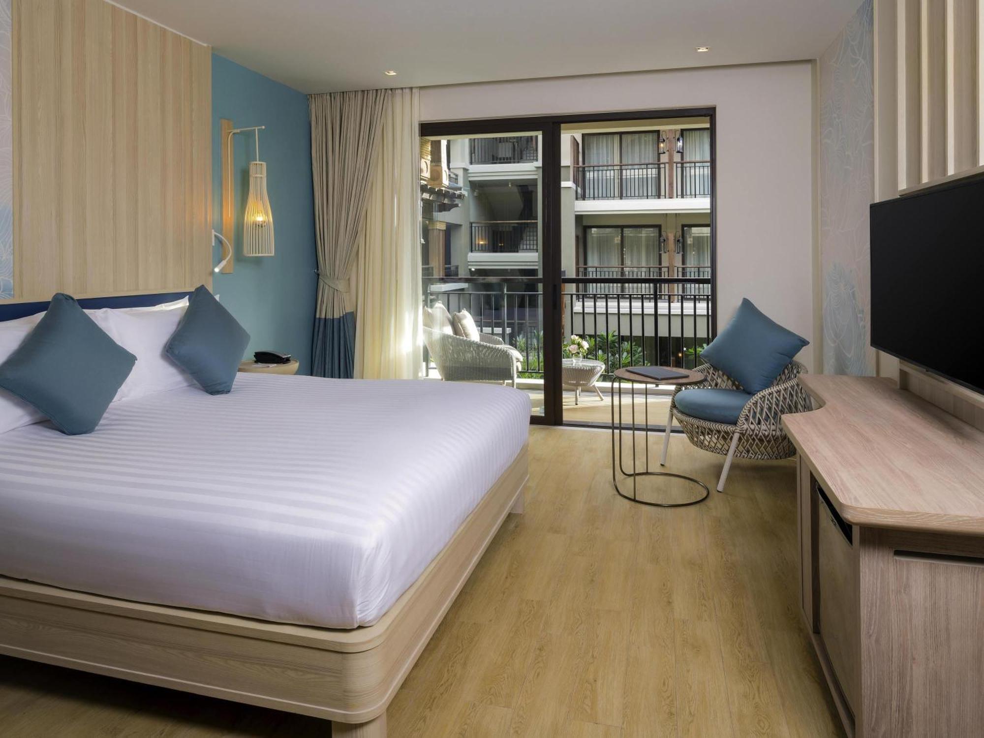 Chambre Double Deluxe - Vue sur Piscine - Côté Plage