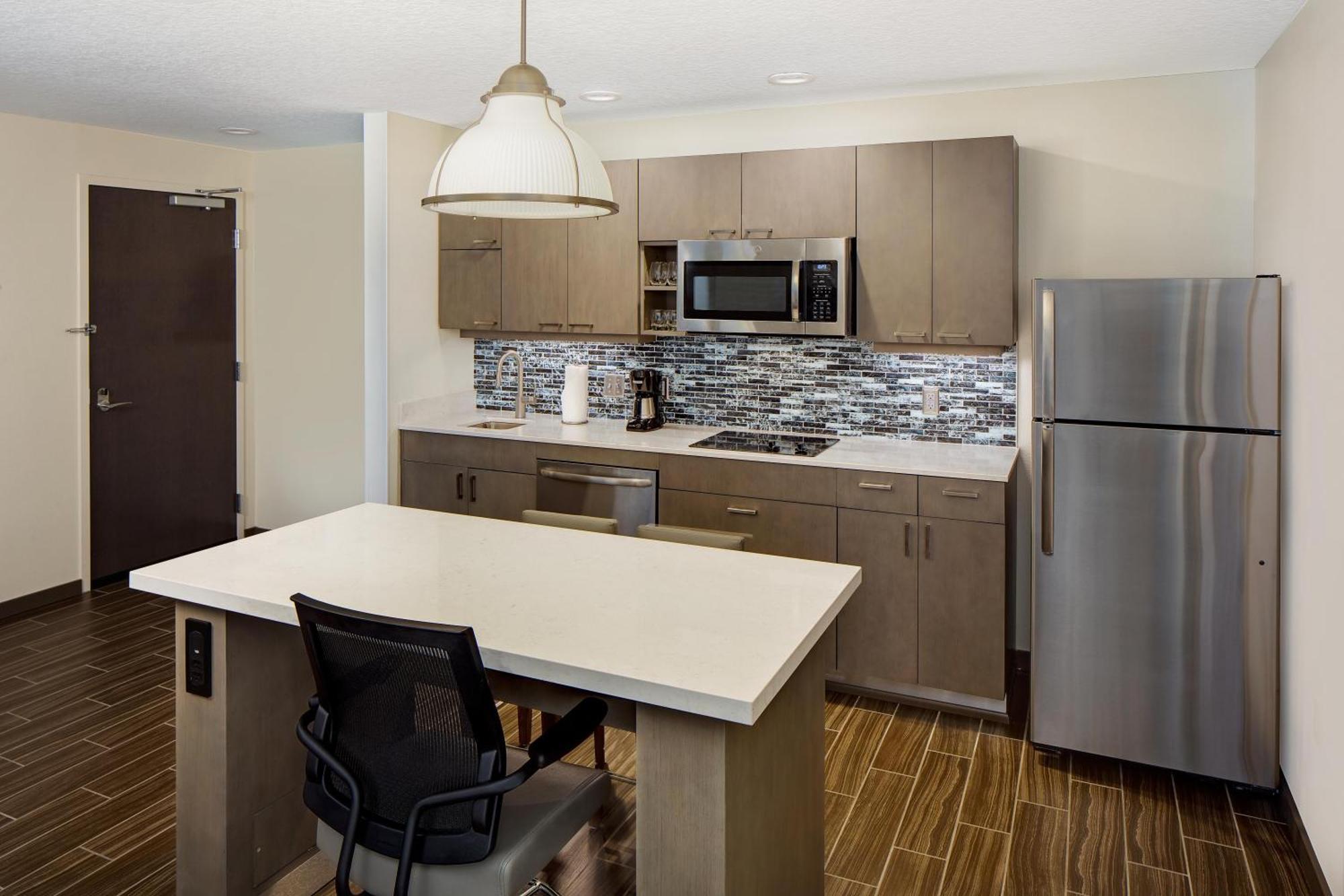 One-Bedroom Specialty Suite Two Queen Beds Kitchen Sofa Bed