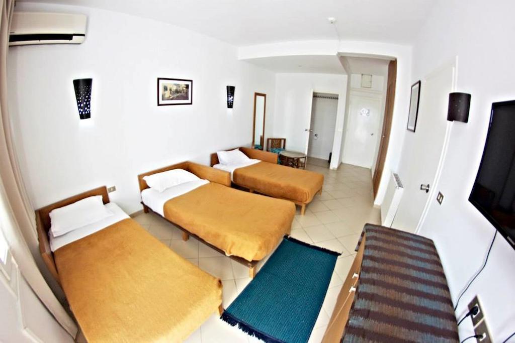 Chambre Triple - Vue sur Jardin