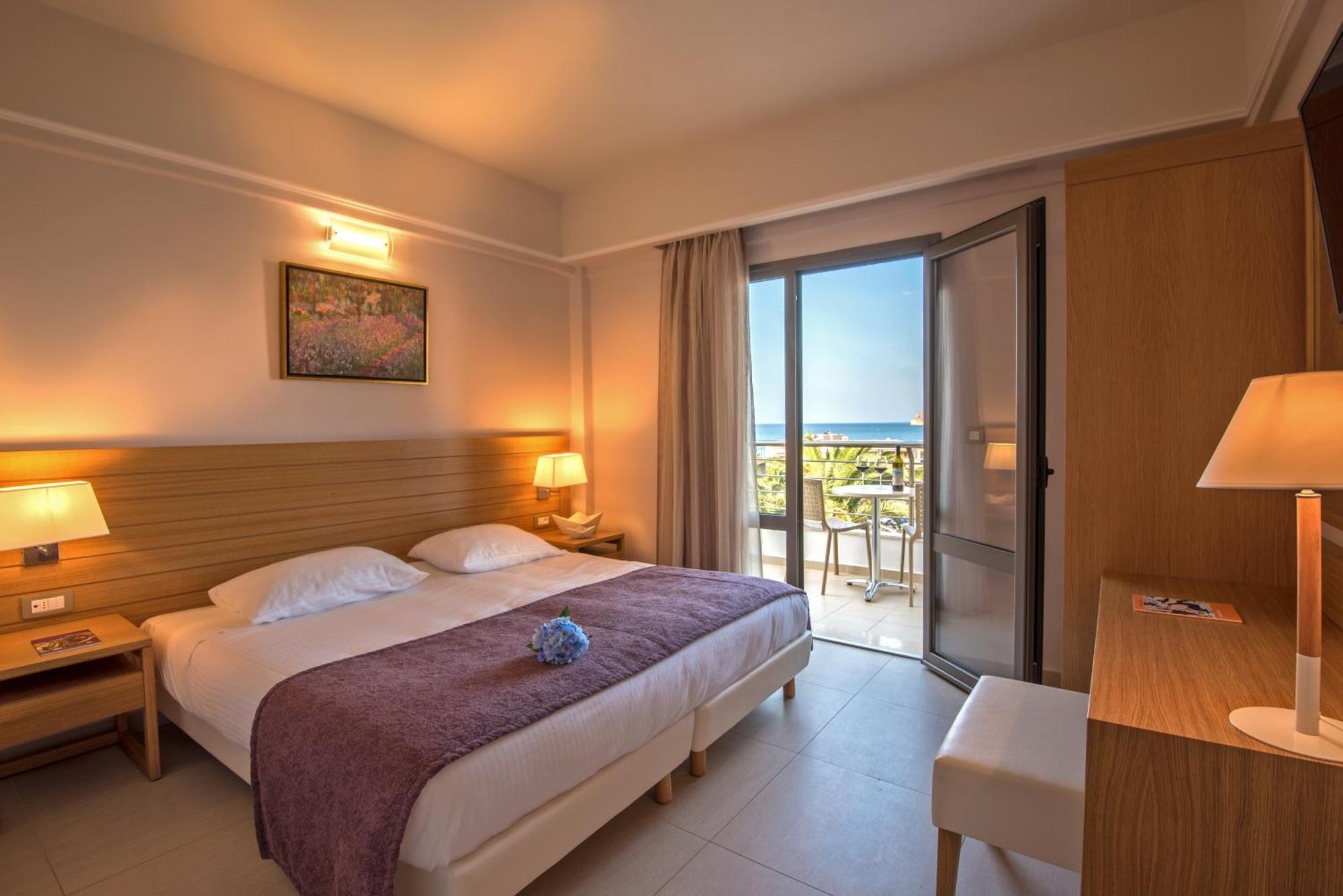 Two Bedrooms Family Room with Pool or Garden View