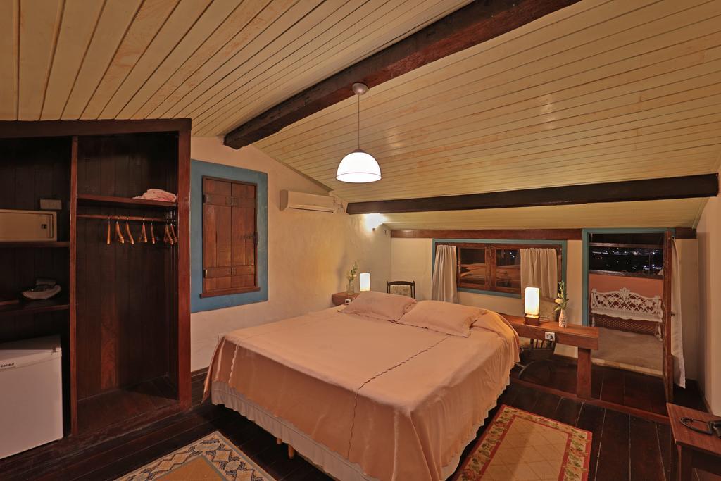 Quarto Triplo com Varanda