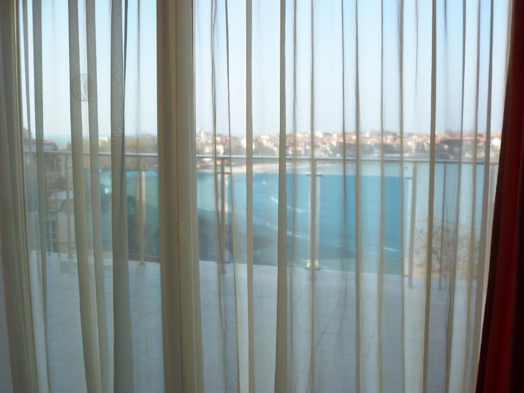 Chambre Lits Jumeaux avec Lit d'Appoint (2 Adultes + 1 Enfant) – Vue sur Mer
