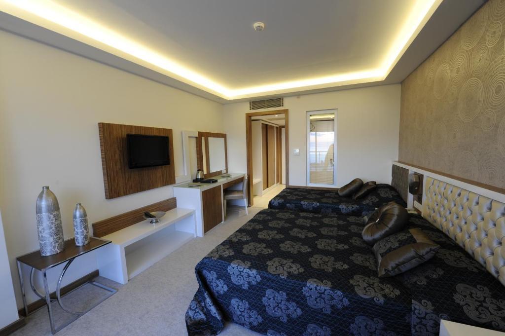 Standaard Tweepersoonskamer met 1 of 2 Bedden en Balkon