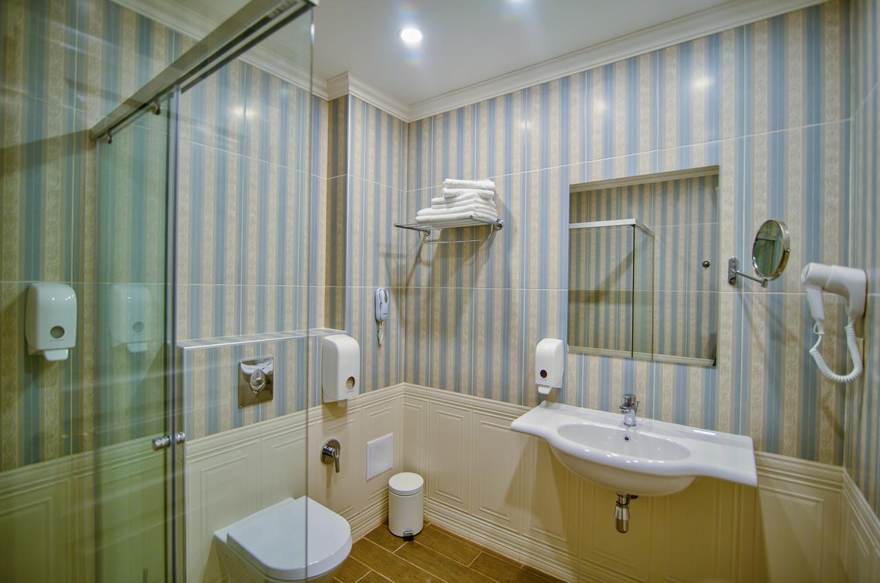 Double room with Partial Sea view (2 Adults + 1 Child)