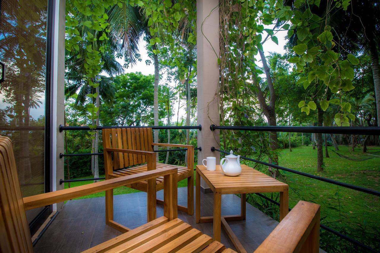 Chambre Triple Deluxe dans Villa avec Climatisation